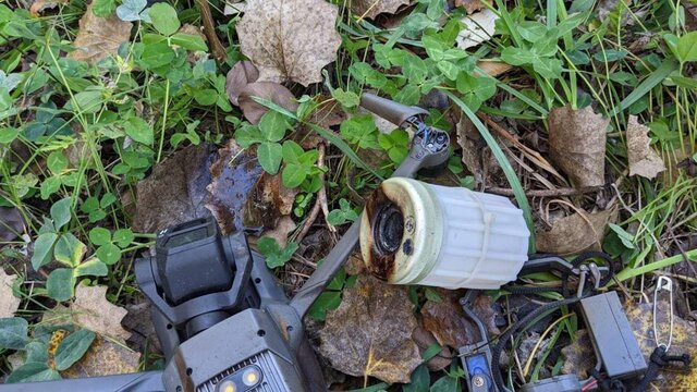 A drone brought down by Ukrainian forces carrying a K-51 tear gad grenade