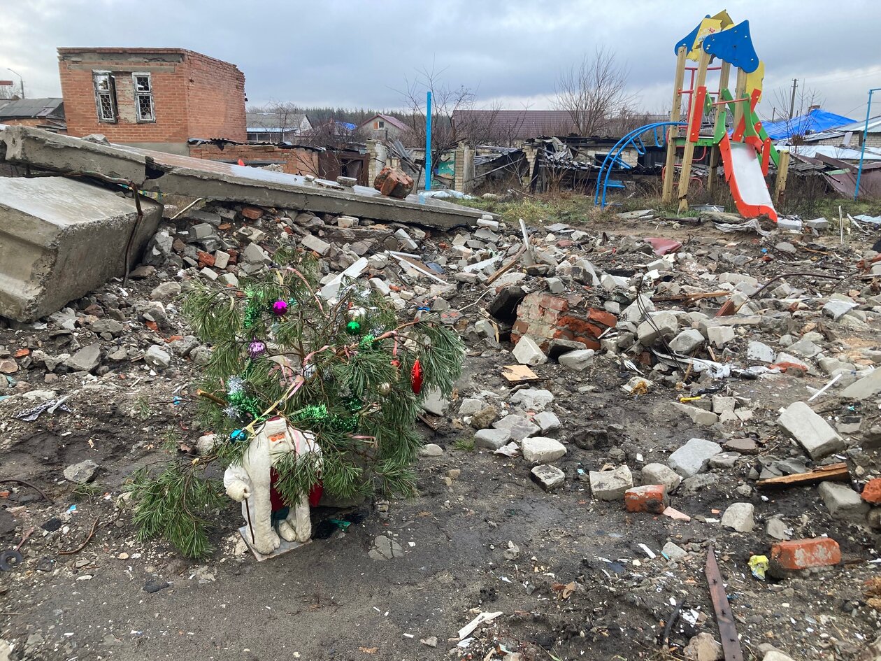 An improvised memorial for civilian victims of a Russian strike