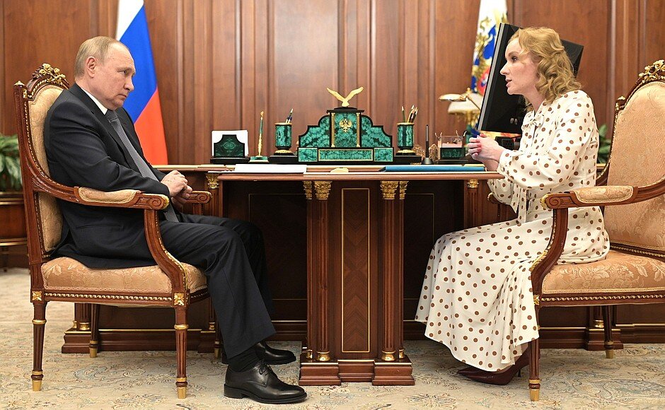 Vladimir Putin and the Russia's children ombudsman Maria Lvova-Belova