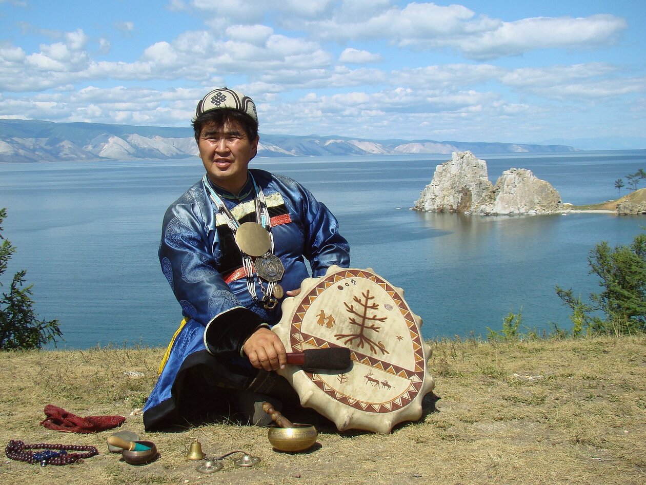 A Buryat shaman on the shore of the Lake Baikal