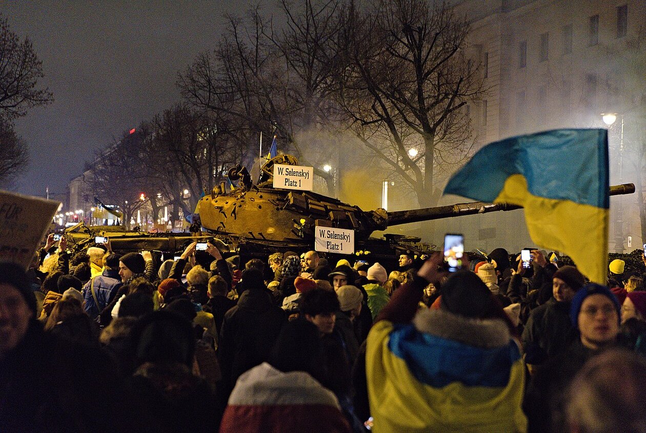 Mass protest in front of the Russian embassy in Berlin, with a destroyed Russian tank, on February 24th 2023