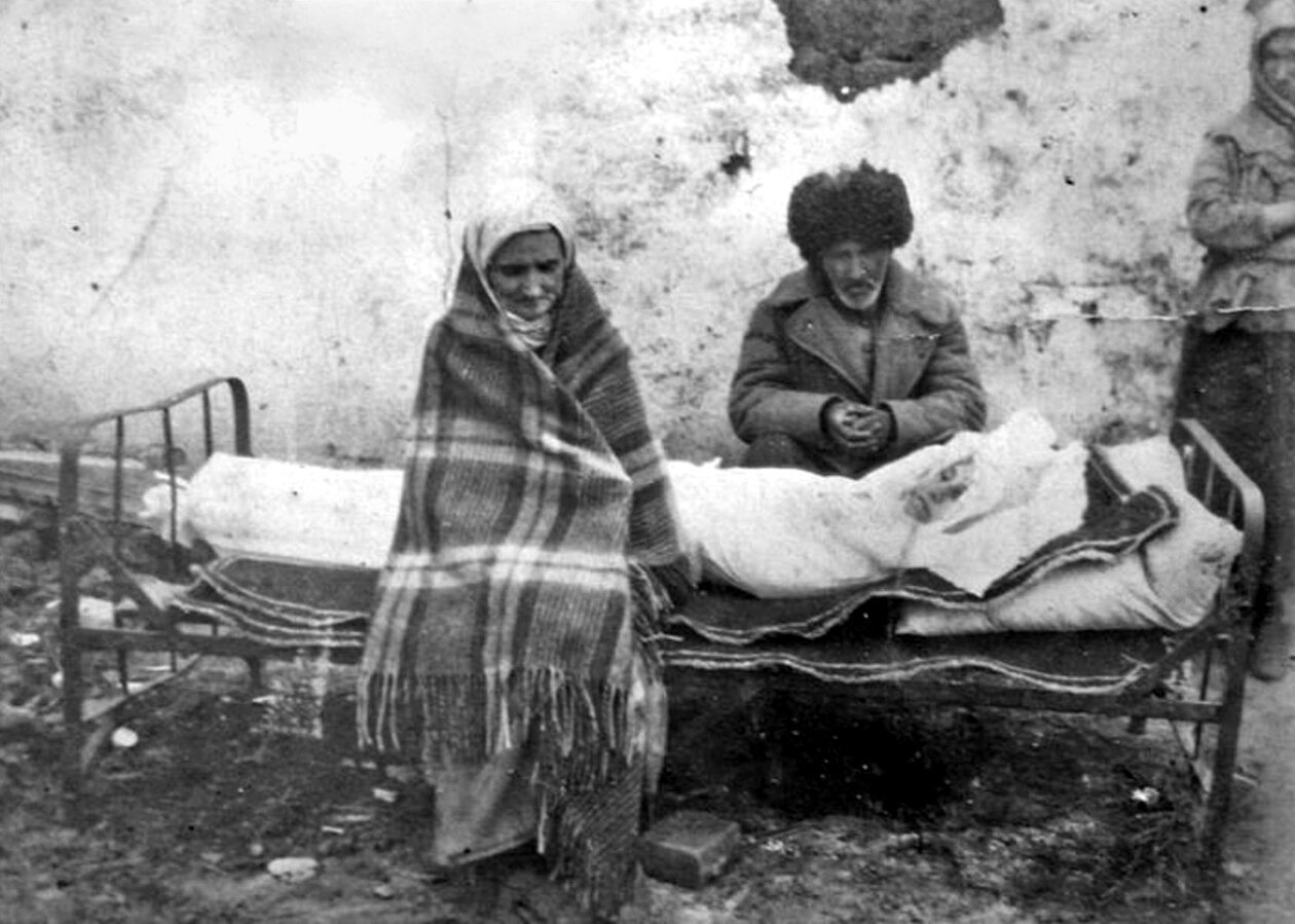 An Ingush family mourning their daughter in Kazakhstan, amid deportation of the Ingush people. 1946