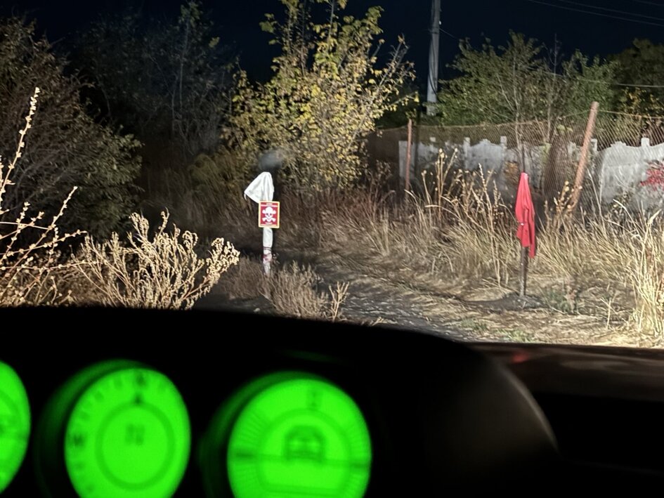 A stop at a mine field in Kharkiv region